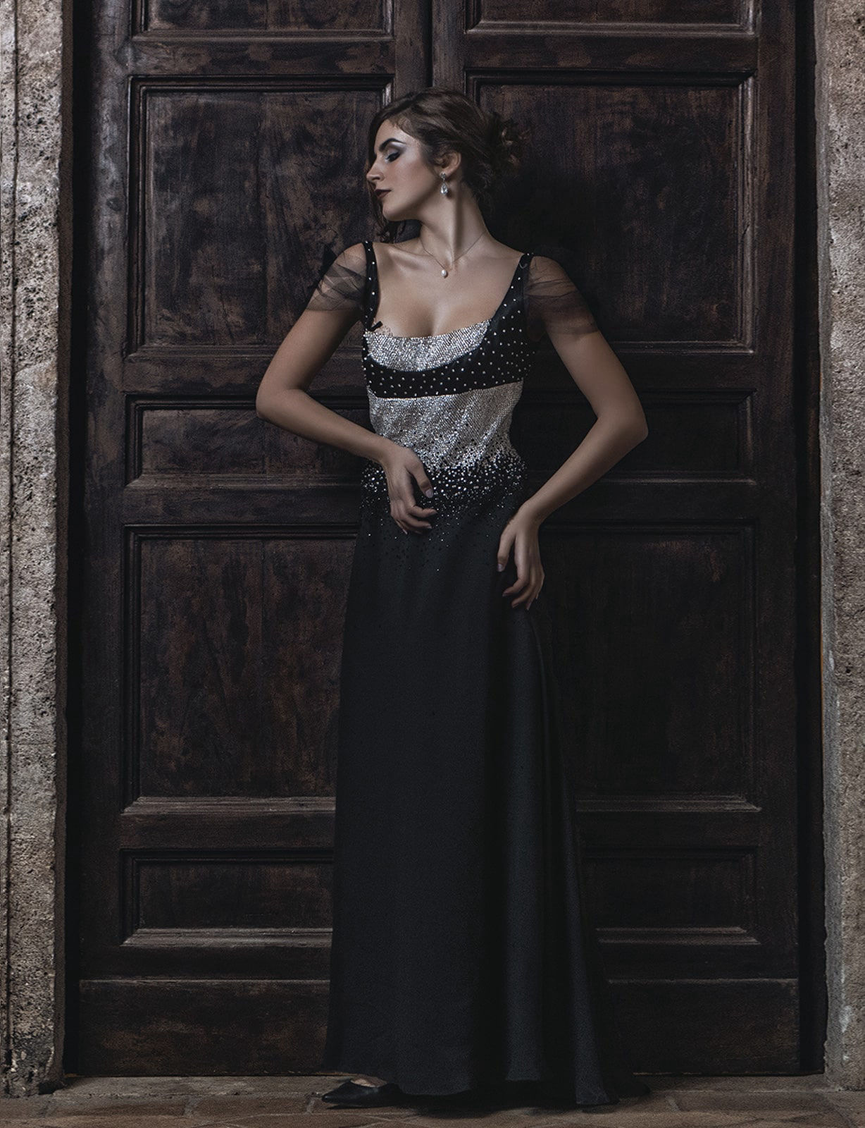 Fine art photography of a model wearing a black dress 